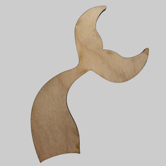 Wooden mermaid tail shape on a white background