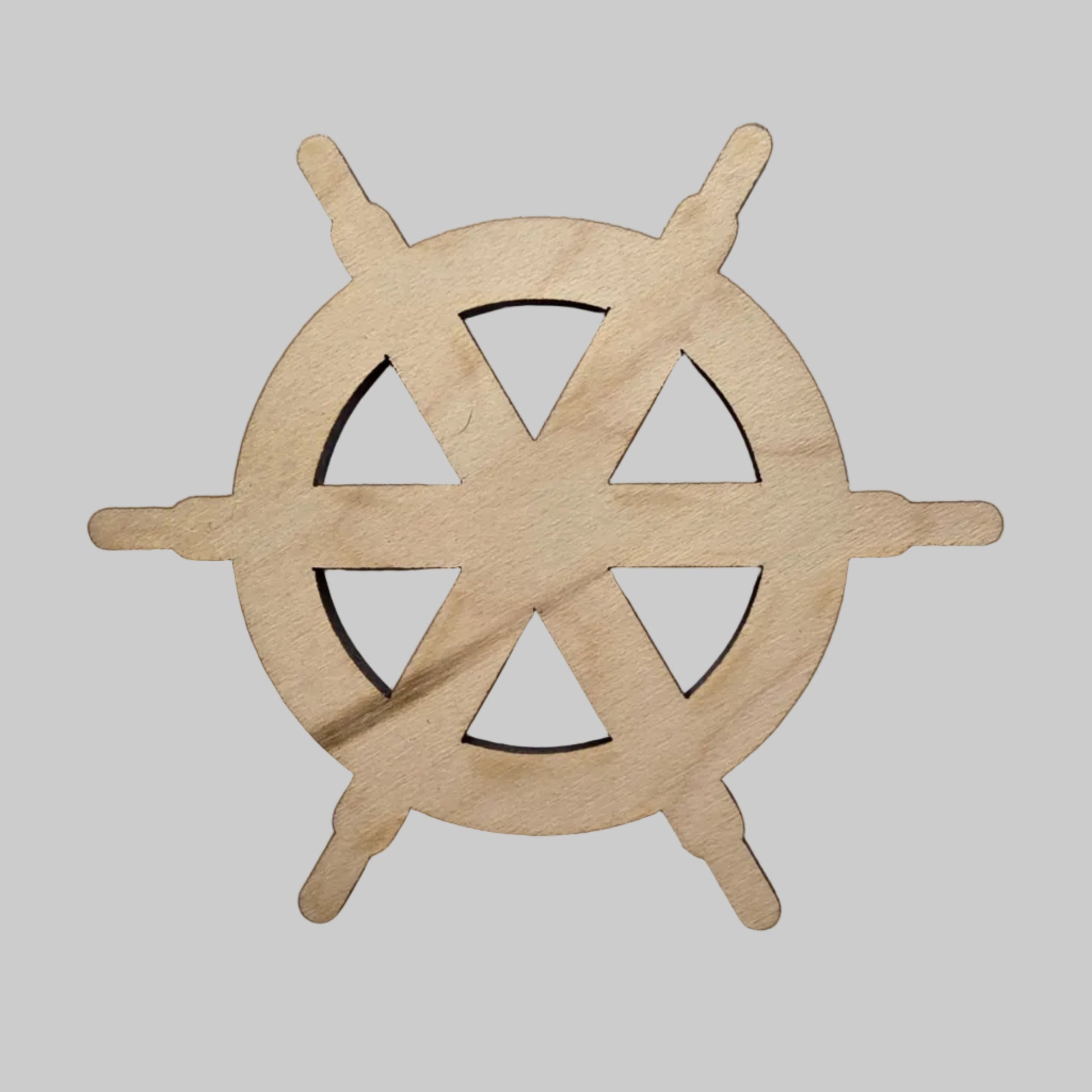 Wooden ship's steering wheel wall decor on a white background