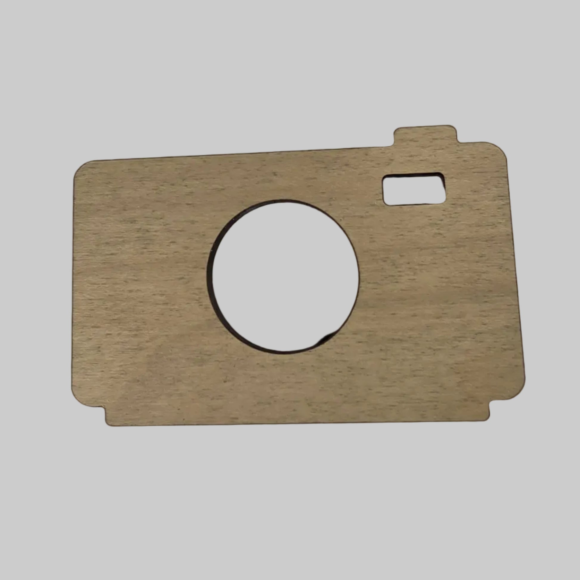Wooden camera shape on a white background