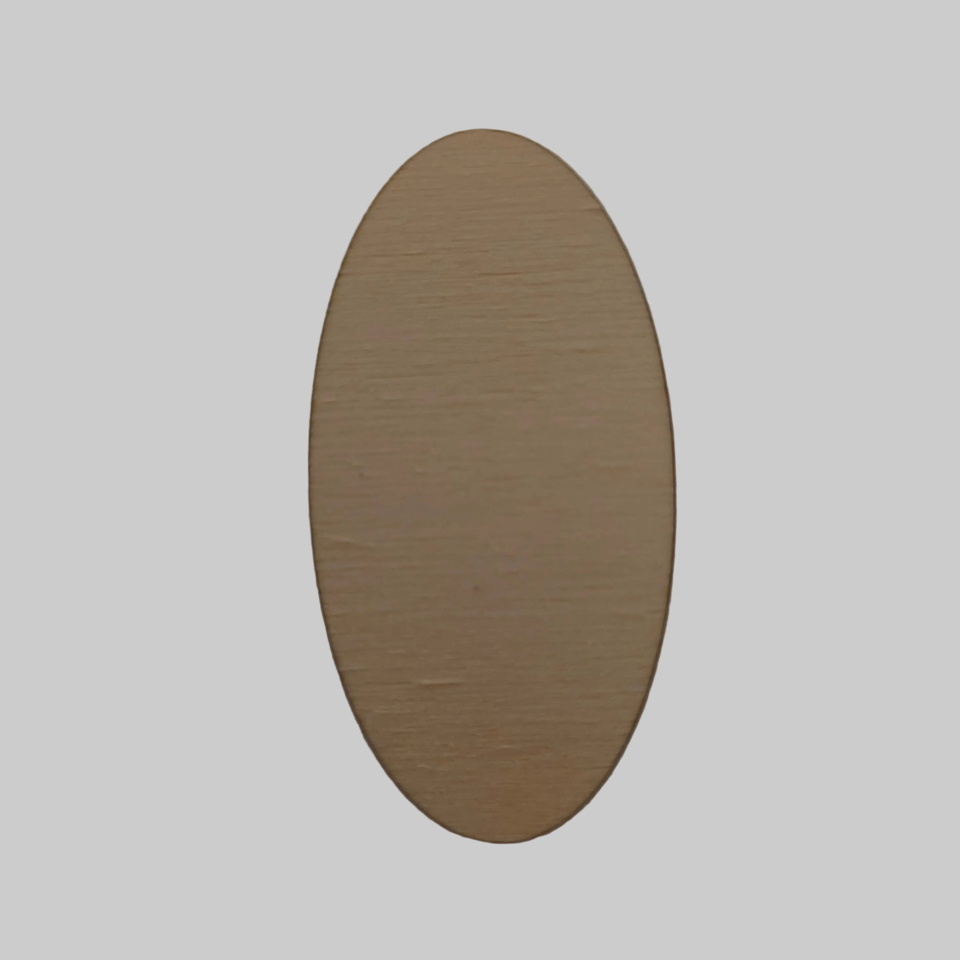 Oval wooden plaque on a plain wall