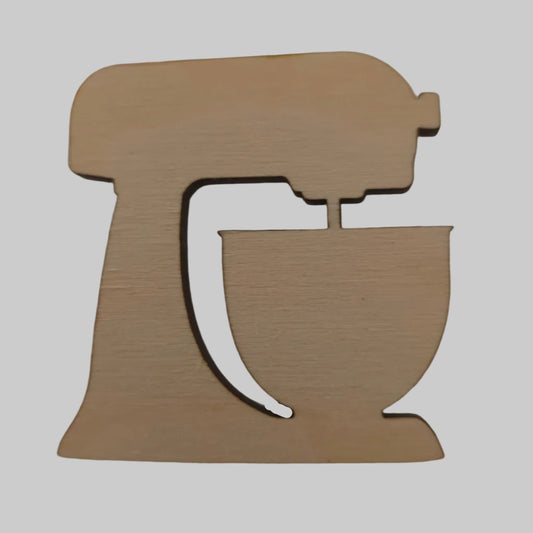 Wooden cutout of a stand mixer on a plain background