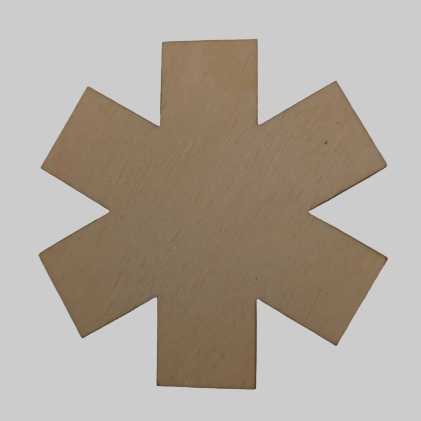 Beige star-shaped object on a beige background