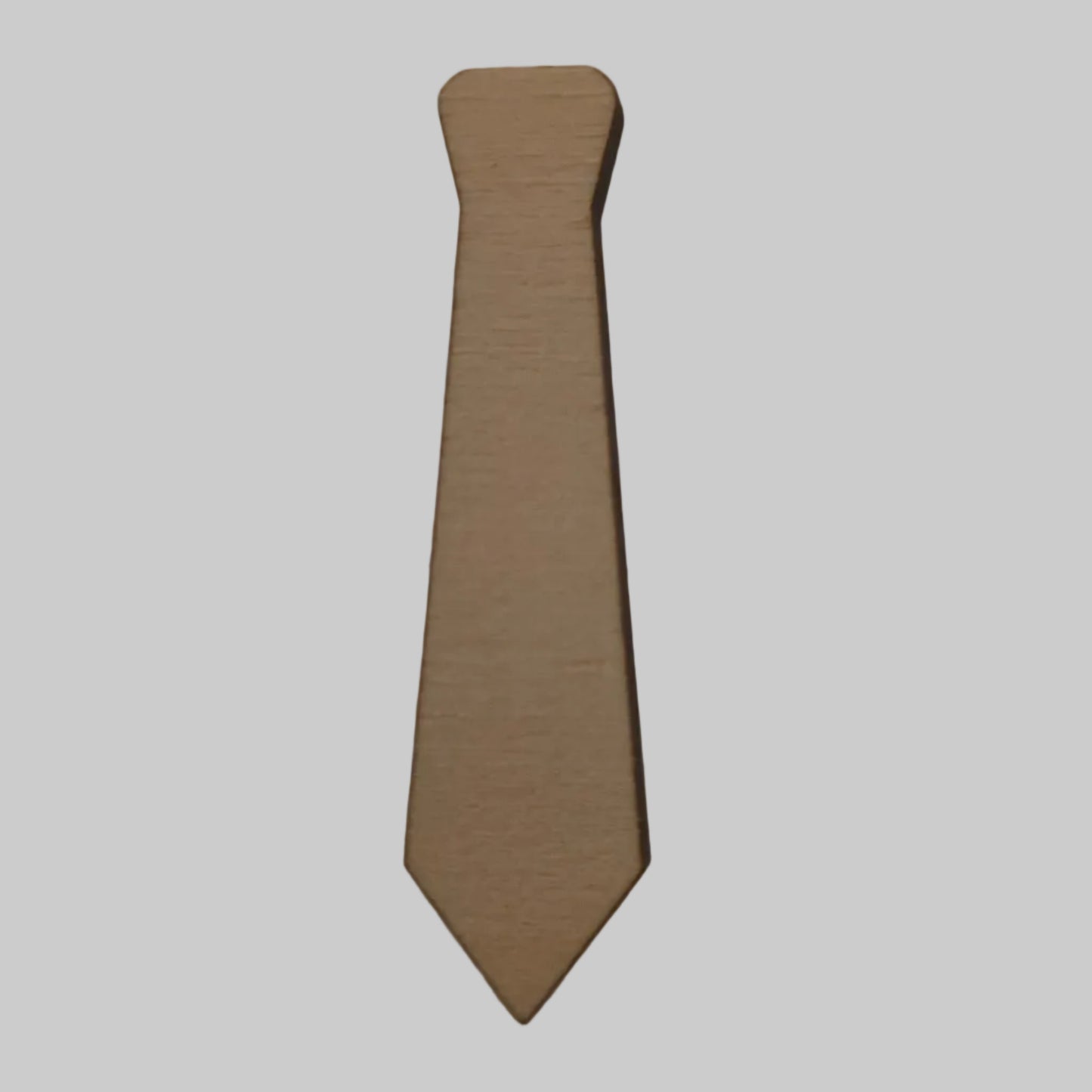 Wooden neck tie shape on a beige background